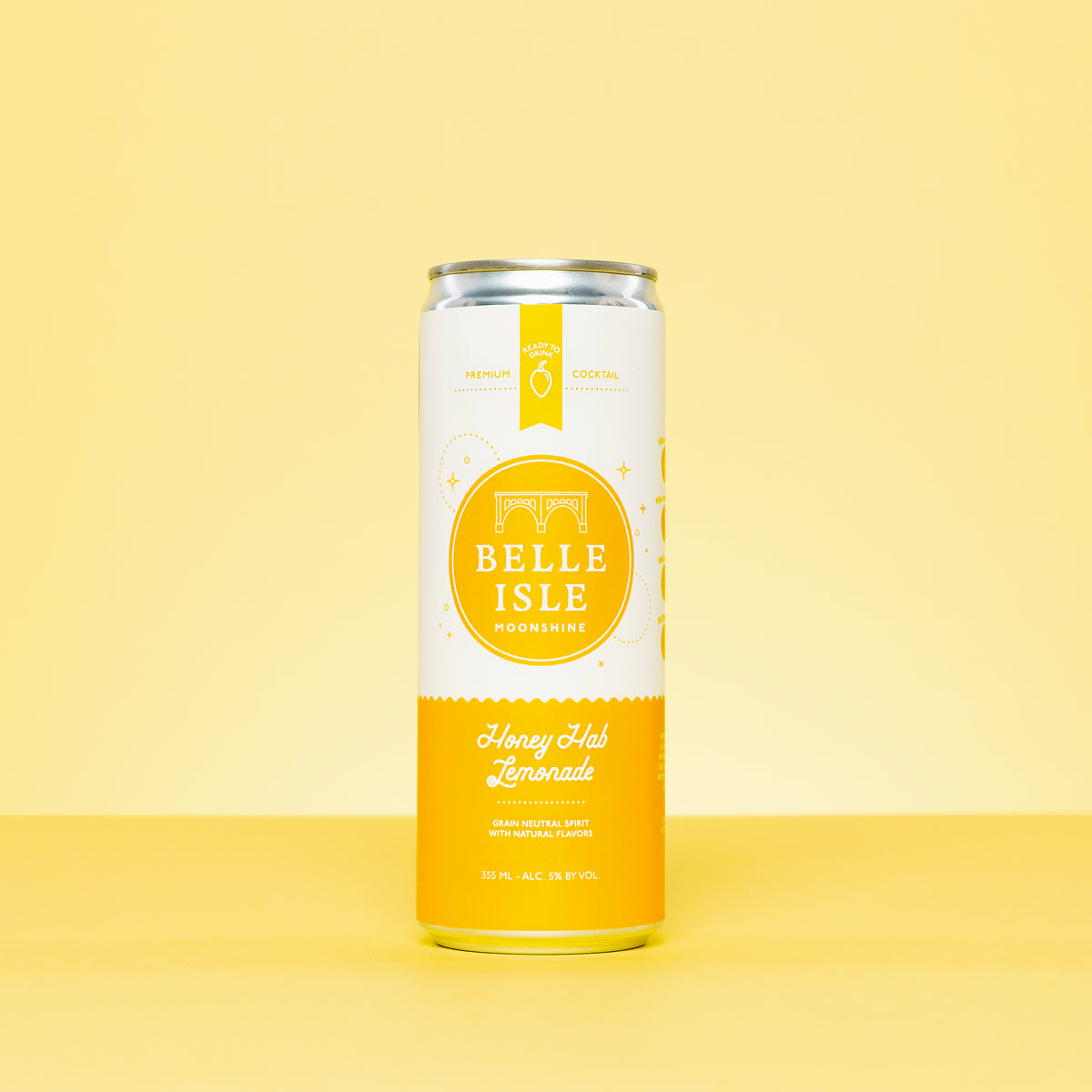 A Belle Isle Honey Hab Lemonade canned cocktail on a yellow background
