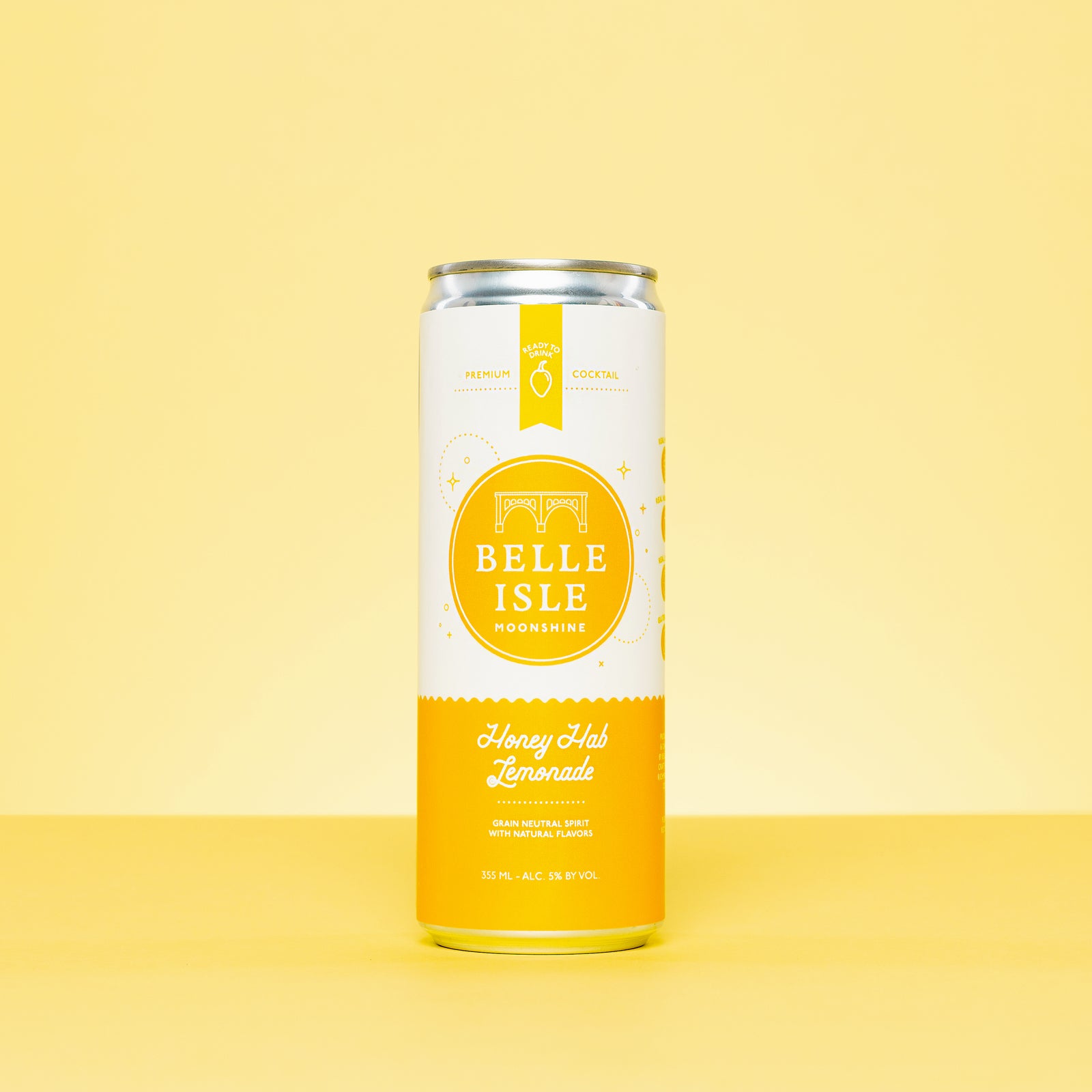 A Belle Isle Honey Hab Lemonade canned cocktail on a yellow background