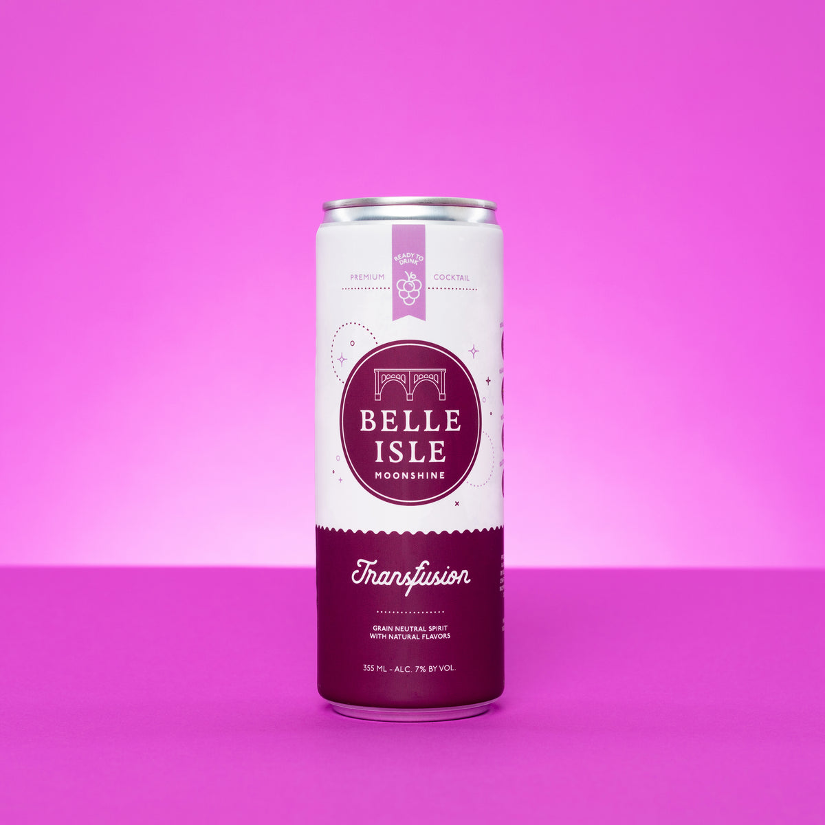 A can of Belle Isle Transfusion canned cocktail against a purple background.